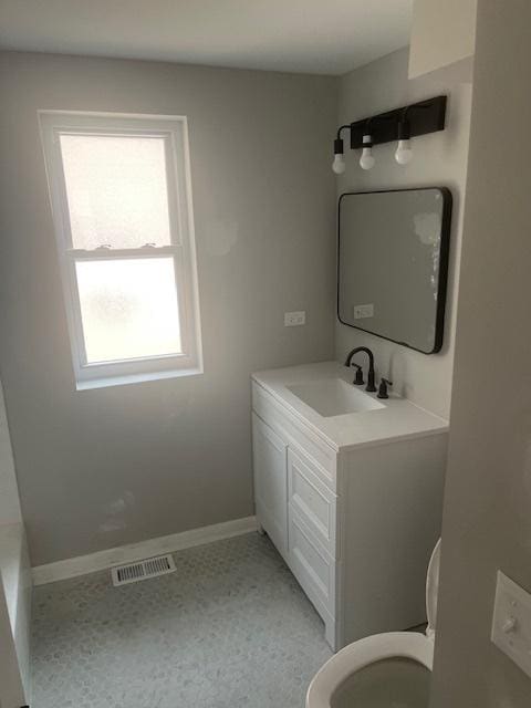 1405 N 24th Ave, Melrose Park, IL 60160 - bathroom with vanity and toilet