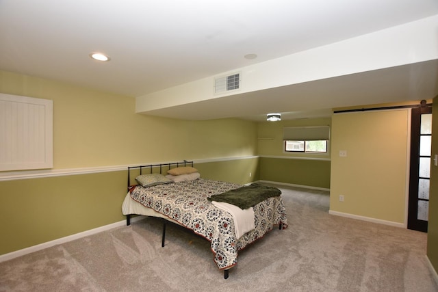 1116 Oakleaf Ave, Mchenry, IL 60051 - carpeted bedroom with recessed lighting and a barn door