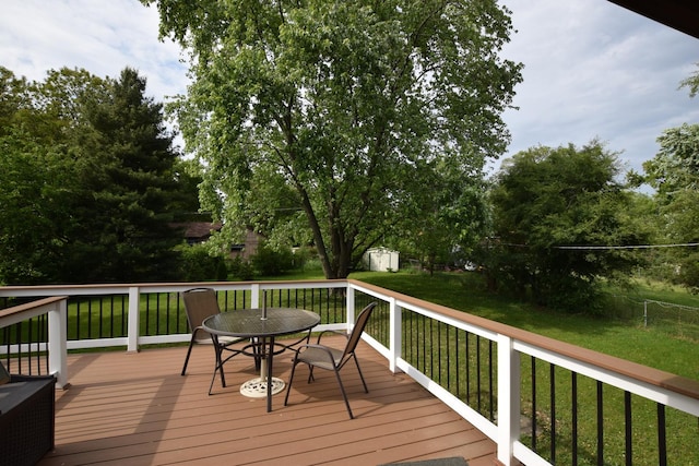 1116 Oakleaf Ave, Mchenry, IL 60051 - deck with a storage shed, outdoor dining space, and a fenced backyard