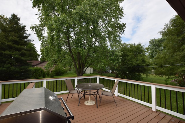 1116 Oakleaf Ave, Mchenry, IL 60051 - wooden deck featuring outdoor dining space, a storage shed, and a yard