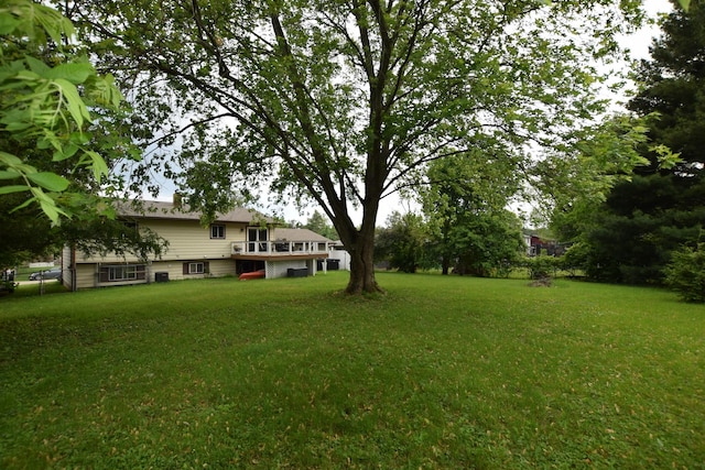 1116 Oakleaf Ave, Mchenry, IL 60051 - view of green lawn featuring a wooden deck