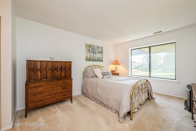 1295 N Sterling Ave Unit 211, Palatine, IL 60067 - bedroom with light colored carpet and baseboards