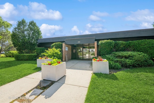 1295 N Sterling Ave Unit 211, Palatine, IL 60067 - view of parking with driveway and an attached carport