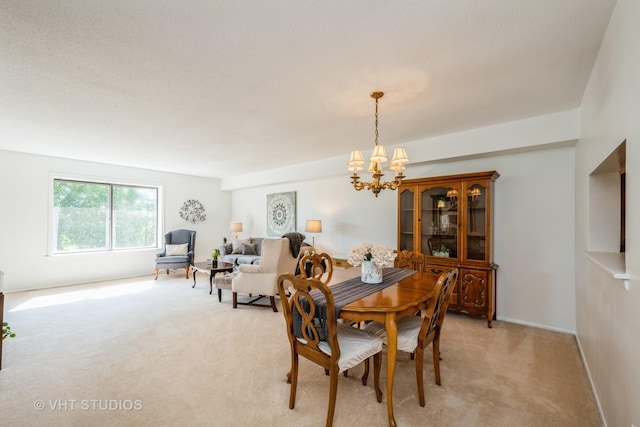 1295 N Sterling Ave Unit 211, Palatine, IL 60067 - dining room with a chandelier and light carpet