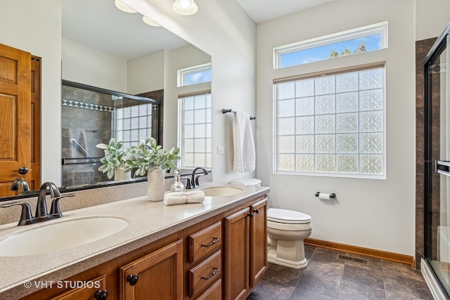 4120 Idlewild Ln, Naperville, IL 60564 - bathroom with a stall shower, double vanity, and stone finish floors