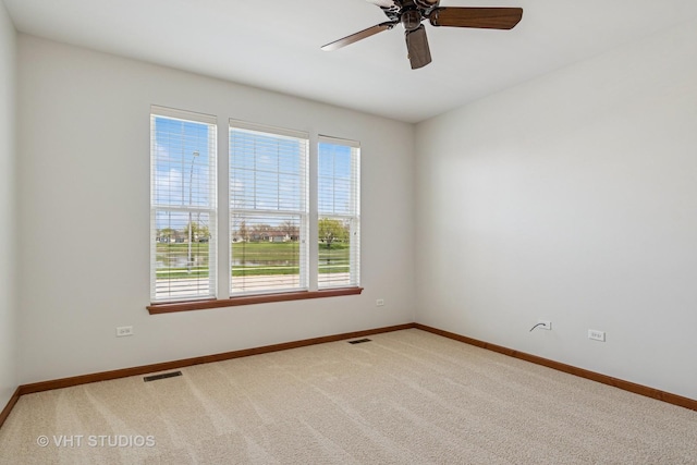 4120 Idlewild Ln, Naperville, IL 60564 - carpeted spare room featuring baseboards and a ceiling fan