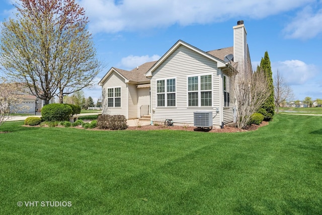 4120 Idlewild Ln, Naperville, IL 60564 - back of house with a chimney, a yard, and roof with shingles