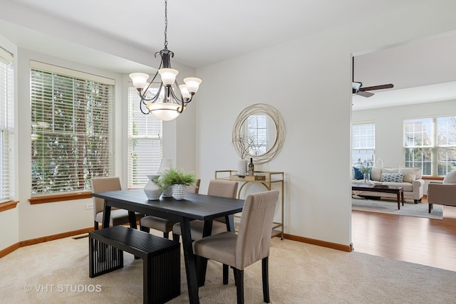 4120 Idlewild Ln, Naperville, IL 60564 - dining space with light colored carpet, a chandelier, and ceiling fan