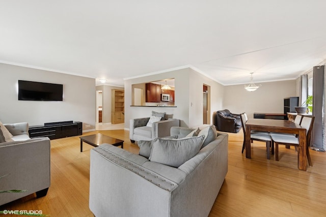 340 Claymoor Rd Unit 2B, Hinsdale, IL 60521 - living area with light wood-type flooring and crown molding