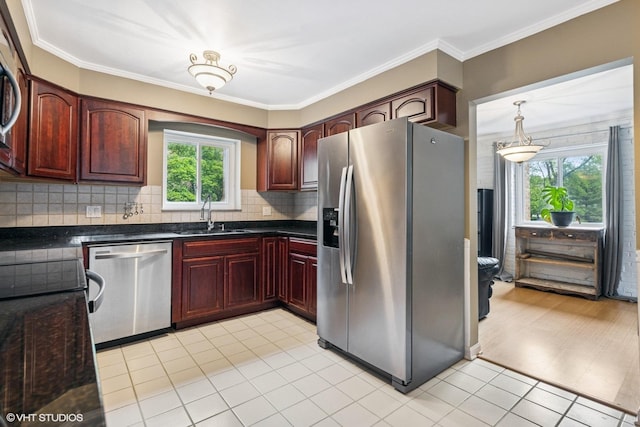 340 Claymoor Rd Unit 2B, Hinsdale, IL 60521 - kitchen featuring appliances with stainless steel finishes, dark countertops, dark brown cabinets, decorative backsplash, and light tile patterned flooring