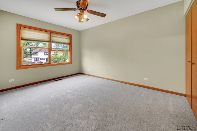 646 Schooner Ln, Elk Grove Village, IL 60007 - carpeted empty room featuring baseboards and ceiling fan