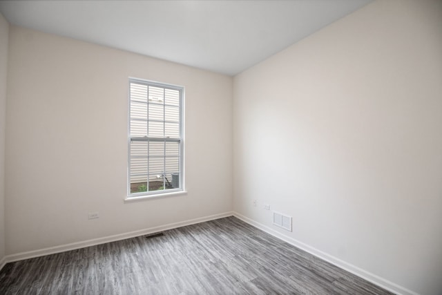 1462 Keller St, Elburn, IL 60119 - spare room with dark wood-style floors and baseboards