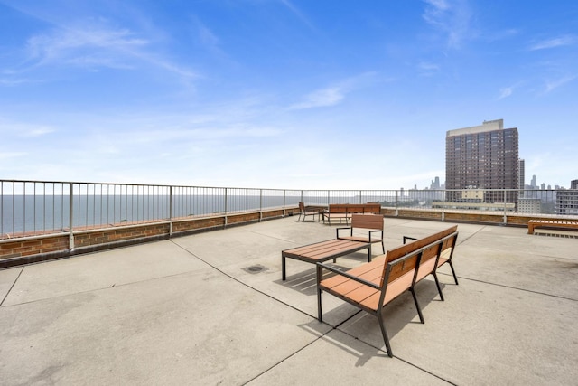 3100 N Lake Shore Dr Unit 413, Chicago, IL 60657 - view of patio / terrace featuring a view of city and a water view