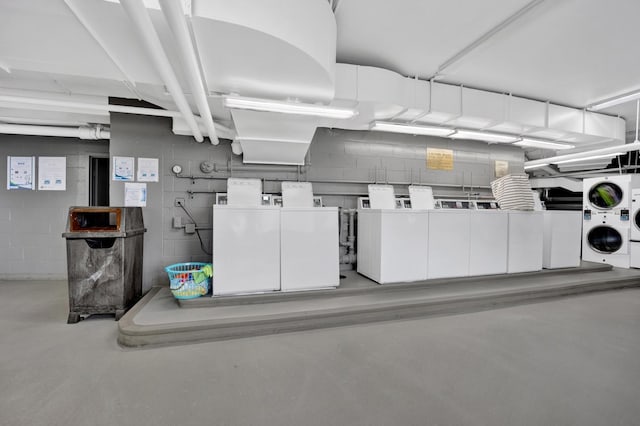 3100 N Lake Shore Dr Unit 413, Chicago, IL 60657 - below grade area featuring washing machine and dryer, stacked washing machine and dryer, and concrete block wall
