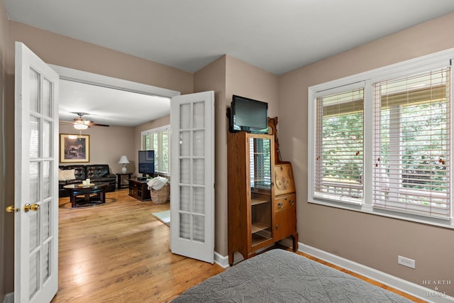 10405 Kenilworth Ave, Algonquin, IL 60102 - bedroom with french doors and light wood-type flooring