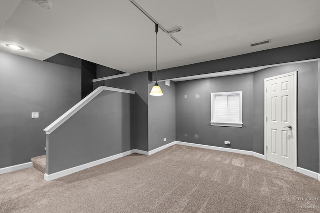 10405 Kenilworth Ave, Algonquin, IL 60102 - basement featuring carpet floors, track lighting, and stairway