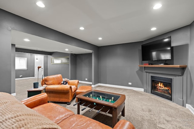 10405 Kenilworth Ave, Algonquin, IL 60102 - carpeted living area with a lit fireplace and recessed lighting
