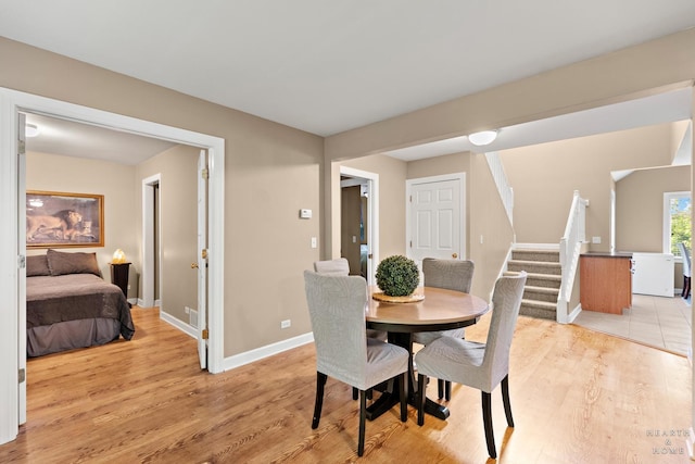10405 Kenilworth Ave, Algonquin, IL 60102 - dining area with stairway and light wood-style flooring