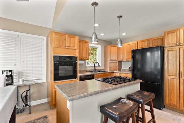 10405 Kenilworth Ave, Algonquin, IL 60102 - kitchen with black appliances, light tile patterned floors, a kitchen island, a kitchen breakfast bar, and recessed lighting