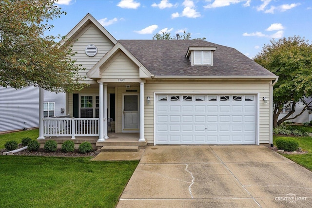 1909 Lakeside Dr, Montgomery, IL 60538 - view of front facade featuring covered porch, driveway, an attached garage, roof with shingles, and a front yard