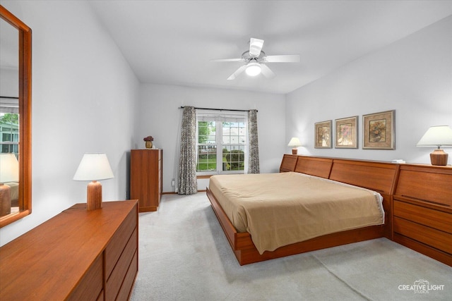 1909 Lakeside Dr, Montgomery, IL 60538 - bedroom featuring light carpet and ceiling fan
