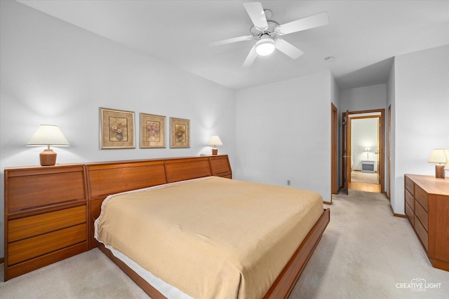 1909 Lakeside Dr, Montgomery, IL 60538 - bedroom featuring light colored carpet and ceiling fan