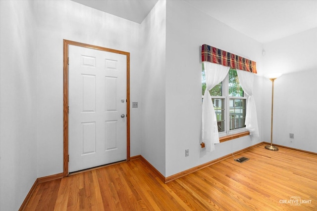 1909 Lakeside Dr, Montgomery, IL 60538 - entrance foyer featuring baseboards and wood finished floors