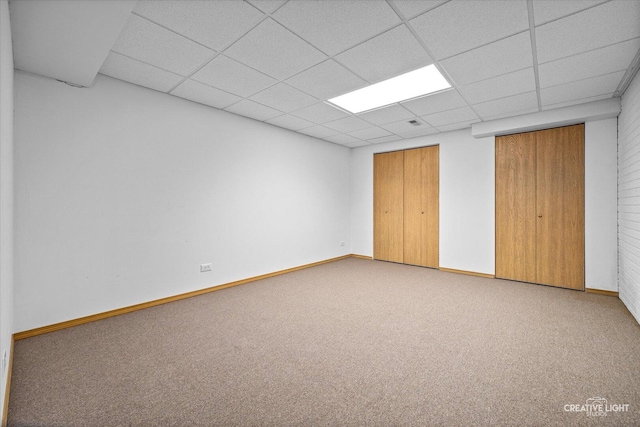 1909 Lakeside Dr, Montgomery, IL 60538 - unfurnished bedroom featuring a drop ceiling, carpet floors, and a closet