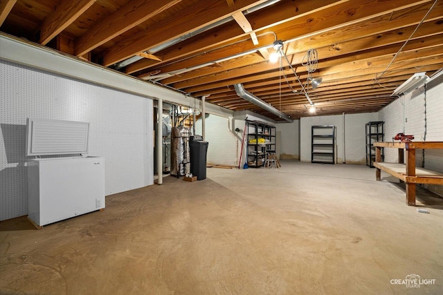 1909 Lakeside Dr, Montgomery, IL 60538 - unfinished below grade area with refrigerator