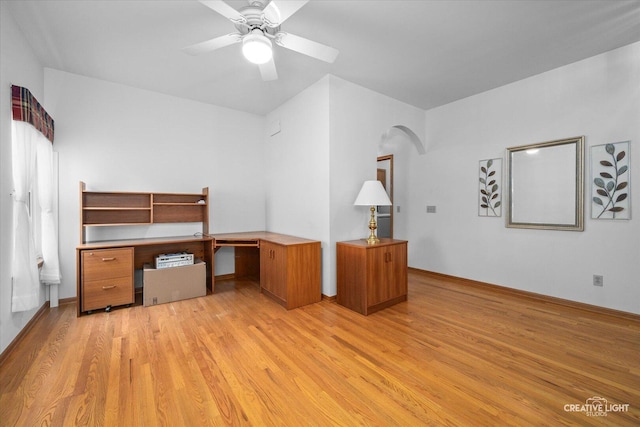 1909 Lakeside Dr, Montgomery, IL 60538 - unfurnished office featuring light wood-style flooring, arched walkways, and ceiling fan