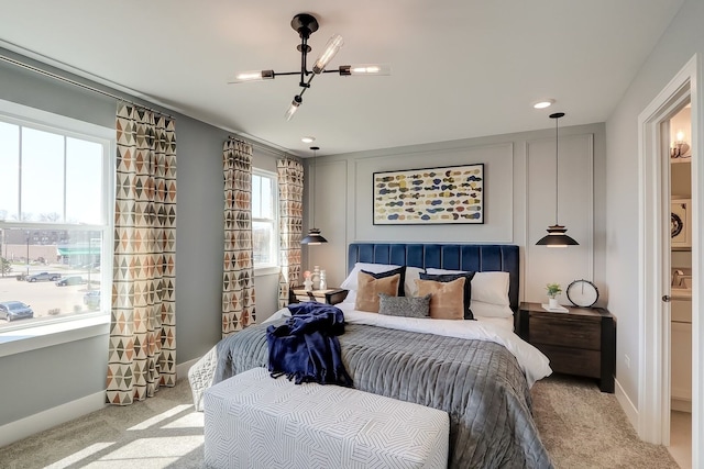 1058 E Oakton St, Des Plaines, IL 60018 - bedroom featuring carpet floors and a chandelier