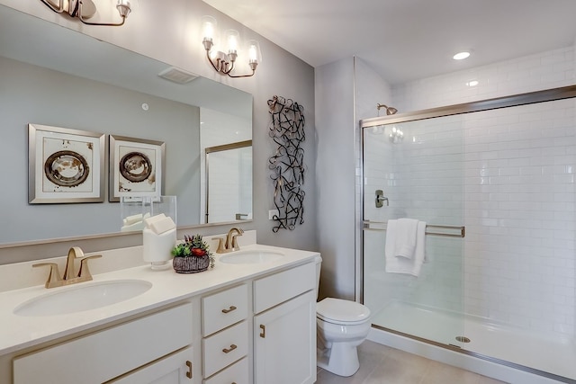 1058 E Oakton St, Des Plaines, IL 60018 - full bathroom featuring a shower stall, double vanity, and tile patterned flooring