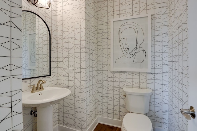 1058 E Oakton St, Des Plaines, IL 60018 - half bathroom featuring tile walls and toilet