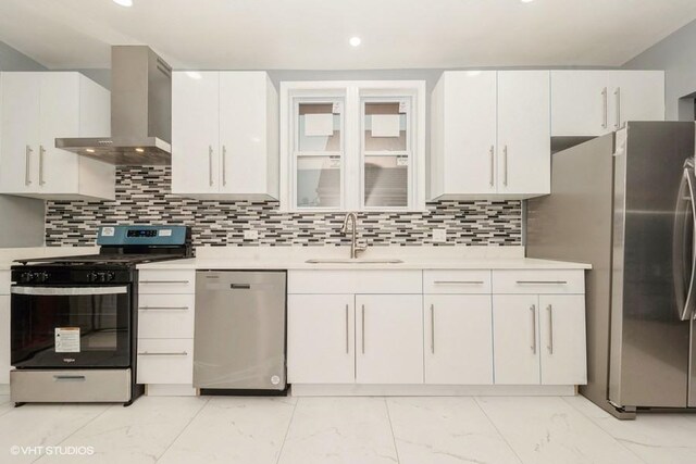 8108 S Wolcott Ave, Chicago, IL 60620 - kitchen with stainless steel appliances, wall chimney exhaust hood, light countertops, light marble finish floors, and decorative backsplash
