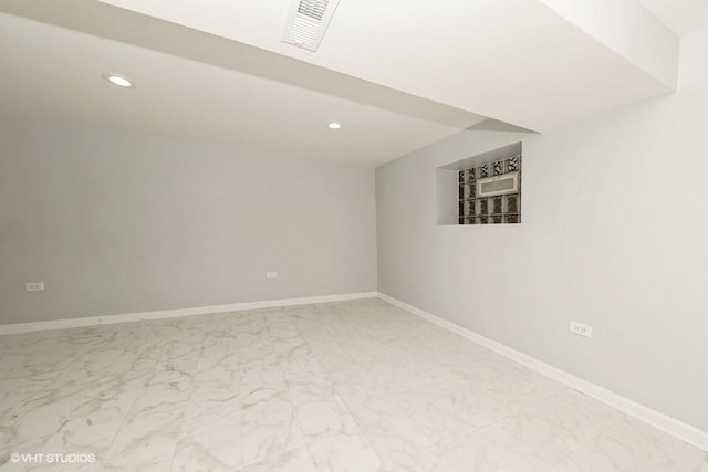 8108 S Wolcott Ave, Chicago, IL 60620 - unfurnished room featuring marble look tiles and recessed lighting