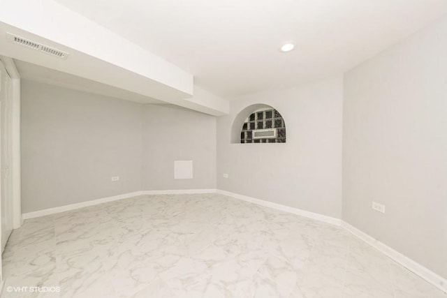 8108 S Wolcott Ave, Chicago, IL 60620 - unfurnished room featuring marble look tiles and recessed lighting