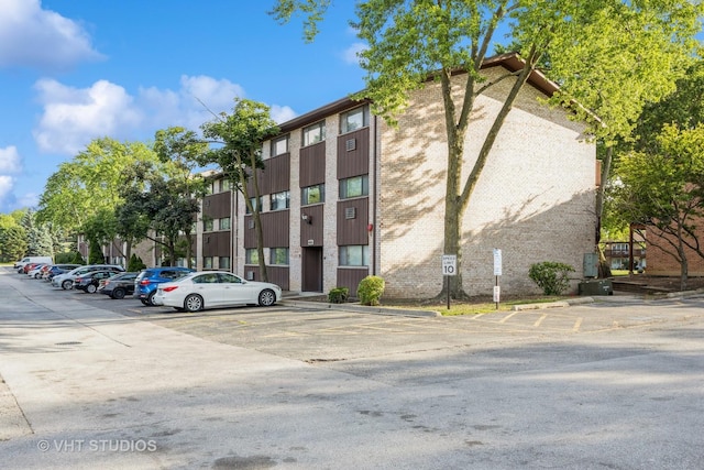 4436 Arbor Cir Unit 4, Downers Grove, IL 60515 - view of property featuring uncovered parking