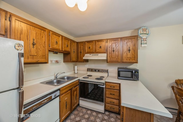 4436 Arbor Cir Unit 4, Downers Grove, IL 60515 - kitchen with white appliances, under cabinet range hood, light countertops, and brown cabinets
