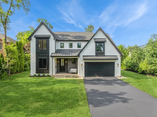 900 Pleasant Ln, Glenview, IL 60025 - modern inspired farmhouse with a standing seam roof, driveway, a metal roof, a front lawn, and roof with shingles