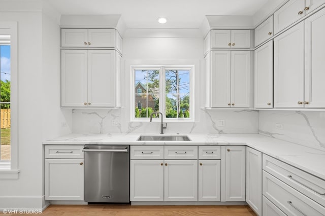 900 Pleasant Ln, Glenview, IL 60025 - kitchen with dishwasher, healthy amount of natural light, tasteful backsplash, light stone countertops, and recessed lighting
