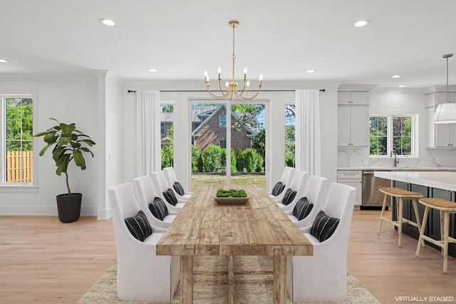 900 Pleasant Ln, Glenview, IL 60025 - dining space featuring plenty of natural light, light wood finished floors, recessed lighting, and ornamental molding