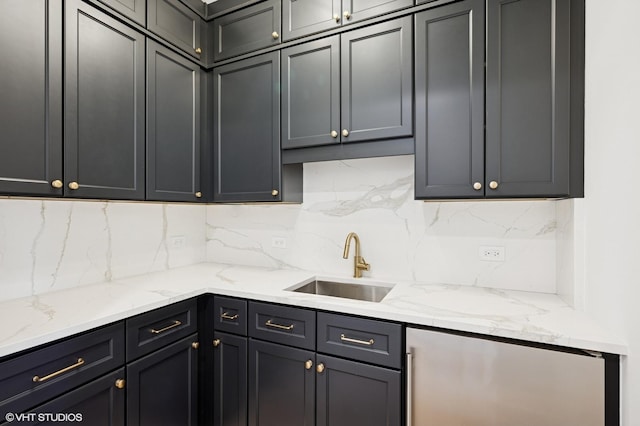 900 Pleasant Ln, Glenview, IL 60025 - kitchen with backsplash, light stone countertops, and refrigerator