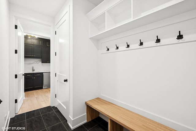 900 Pleasant Ln, Glenview, IL 60025 - mudroom featuring dark tile patterned floors and baseboards