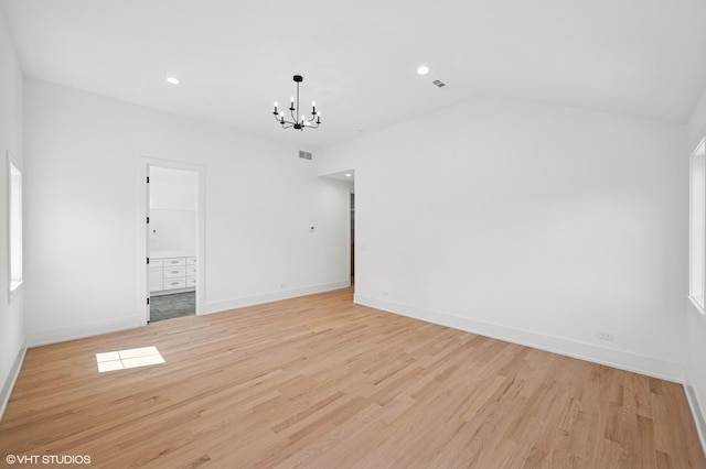 900 Pleasant Ln, Glenview, IL 60025 - spare room featuring a chandelier, light wood finished floors, recessed lighting, and lofted ceiling