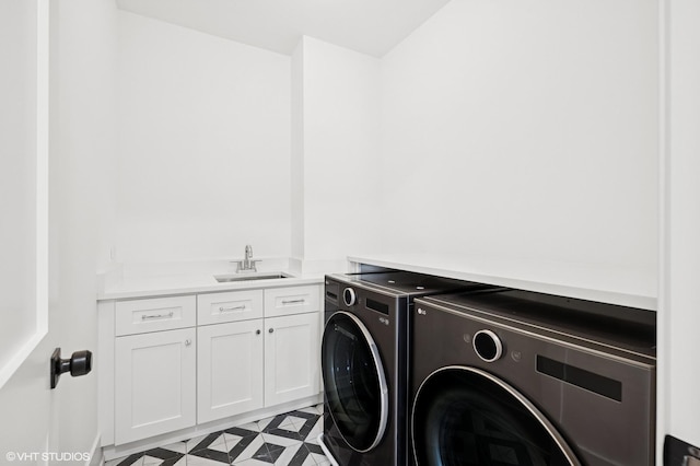 900 Pleasant Ln, Glenview, IL 60025 - washroom with washer and dryer, cabinet space, and tile patterned floors