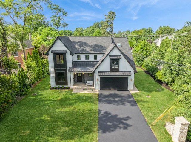 900 Pleasant Ln, Glenview, IL 60025 - modern inspired farmhouse with a standing seam roof, asphalt driveway, a shingled roof, a front yard, and a porch