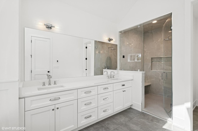 900 Pleasant Ln, Glenview, IL 60025 - full bathroom with double vanity, vaulted ceiling, and a stall shower