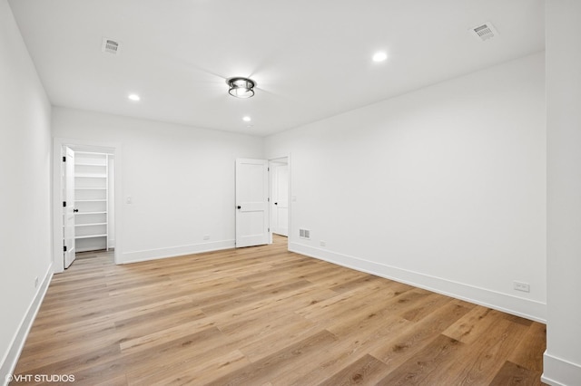 900 Pleasant Ln, Glenview, IL 60025 - empty room with light wood-type flooring and recessed lighting