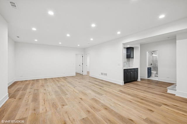 900 Pleasant Ln, Glenview, IL 60025 - basement with recessed lighting and light wood finished floors