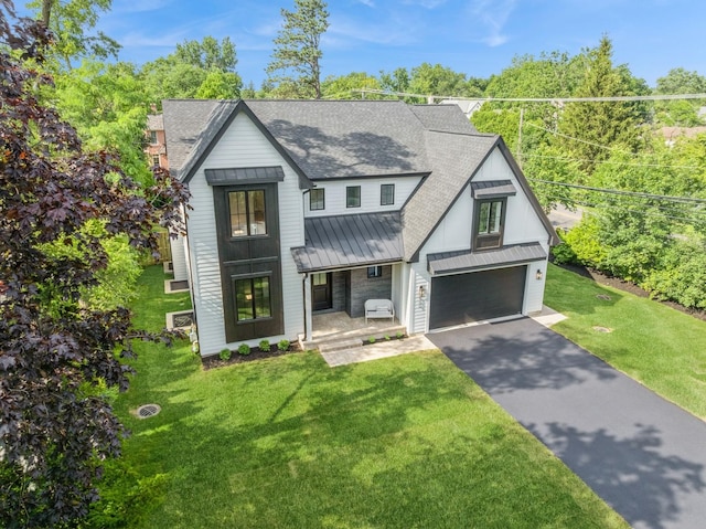 900 Pleasant Ln, Glenview, IL 60025 - modern inspired farmhouse with a standing seam roof, covered porch, roof with shingles, driveway, and a metal roof